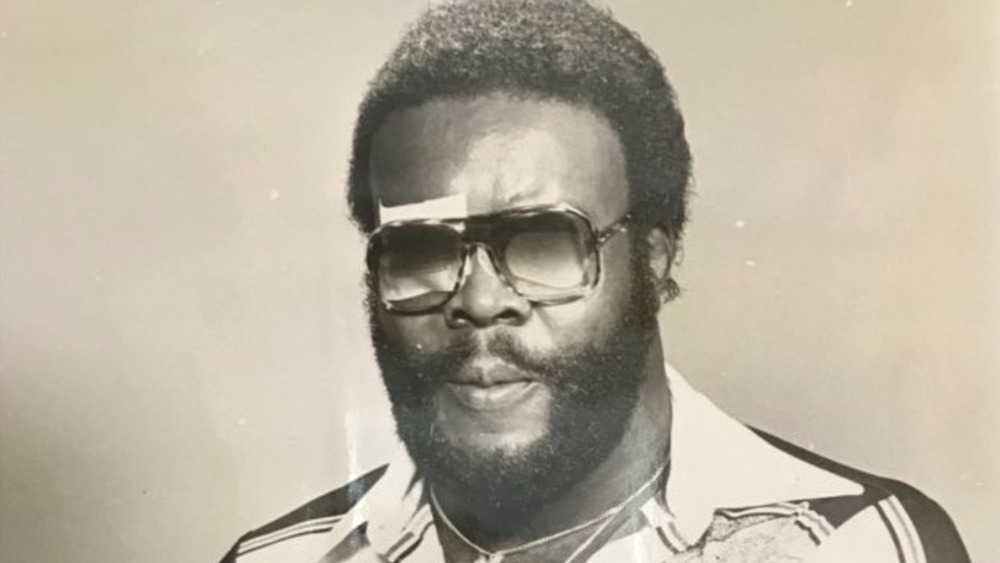 Blinded Junkyard Dog with sunglasses
