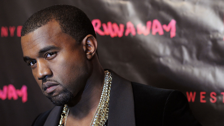 Kanye glares