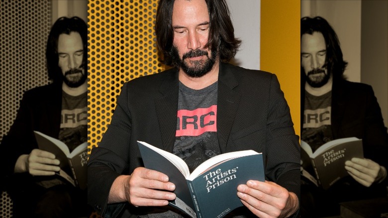 keanu reeves reading a book