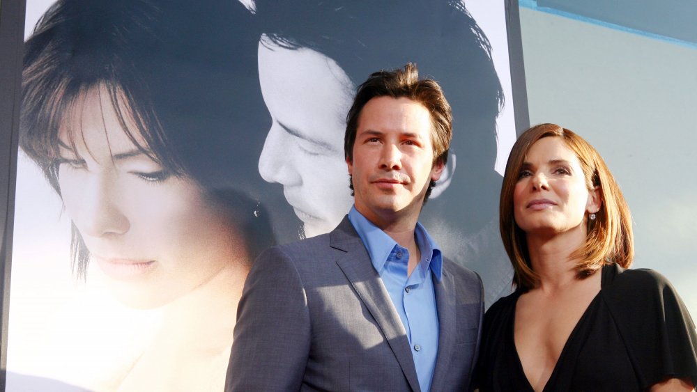 keanu reeves and sandra bullock smiling