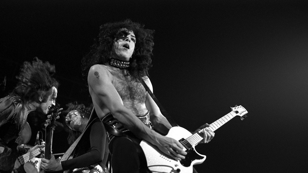 Paul Stanley playing guitar