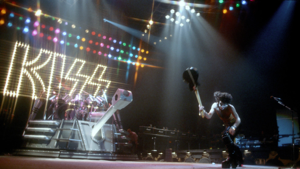 KISS playing onstage in 1977