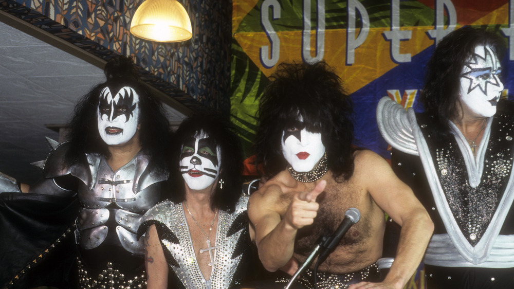 kiss giving a press conference in 1999