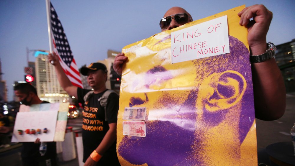 Hong Kong protests holding placards