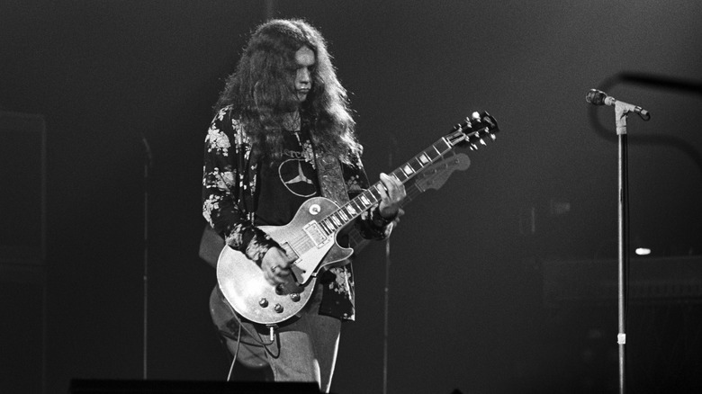 Young Gary Rossington playing guitar