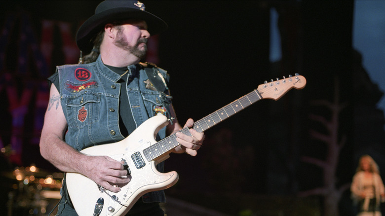 Hughie Thomasson playing guitar