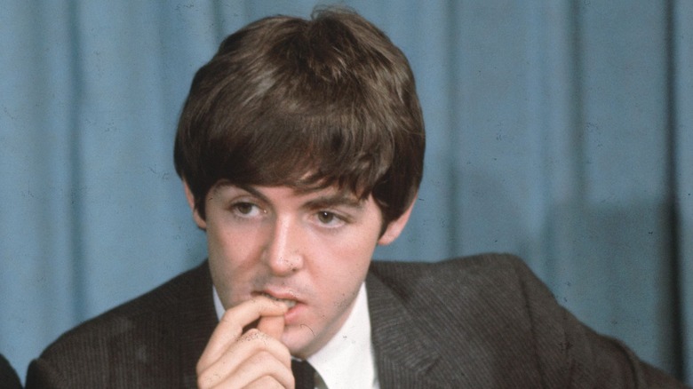 Paul McCartney biting fingers