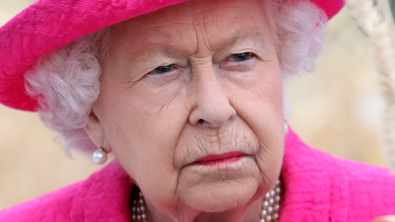Queen Elizabeth II wearing pink
