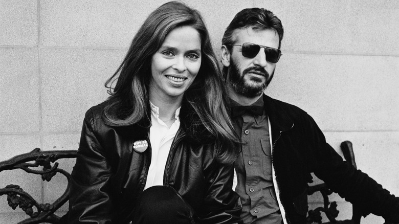 Barbara Bach smiling with serious Ringo Starr in publicity photo