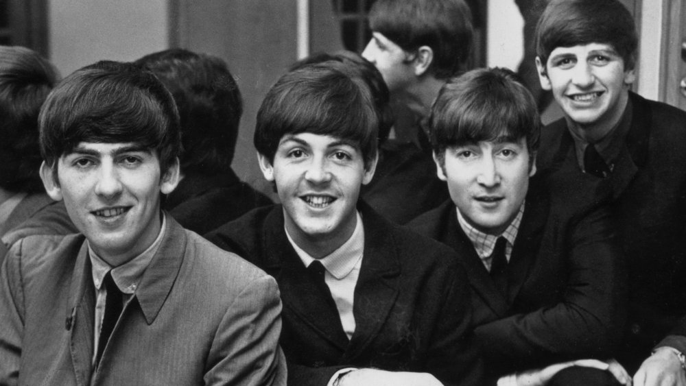 The Beatles smiling