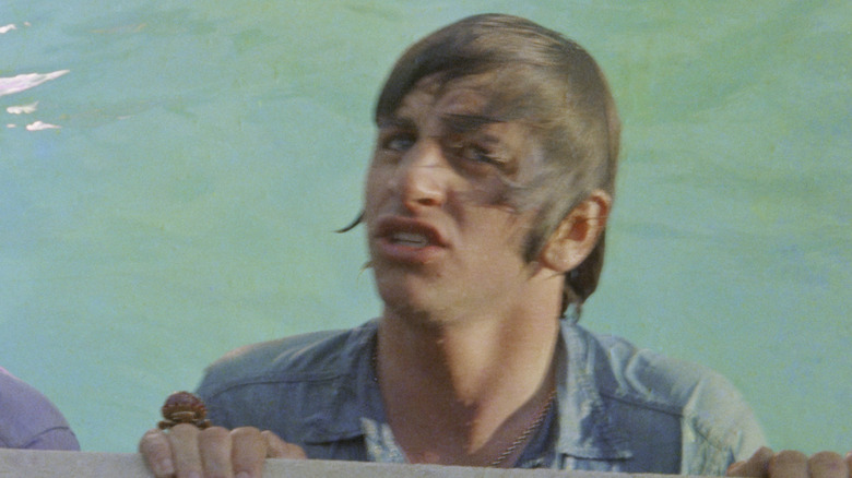 Ringo Starr unhappy climbing out of pool during filming of Help!