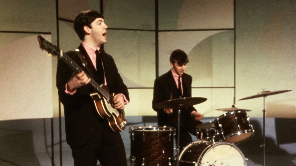 Paul McCartney and Ringo Starr performing onstage