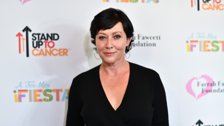 Shannen Doherty black dress hoop earrings cancer fundraiser