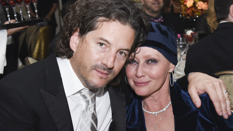 Kurt Iswarienko embracing Shannen Doherty