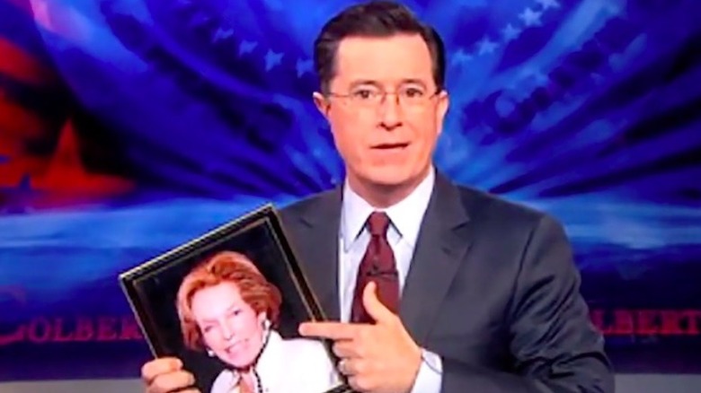 Stephen Colbert holding photo of his mother on The Colbert Report