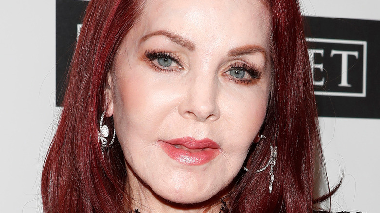 Priscilla Presley posing at event