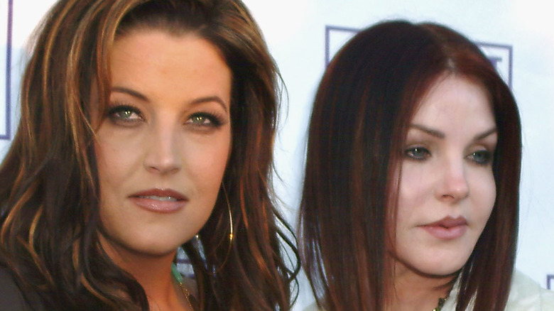 Lisa Marie Presley posing with mom, Priscilla