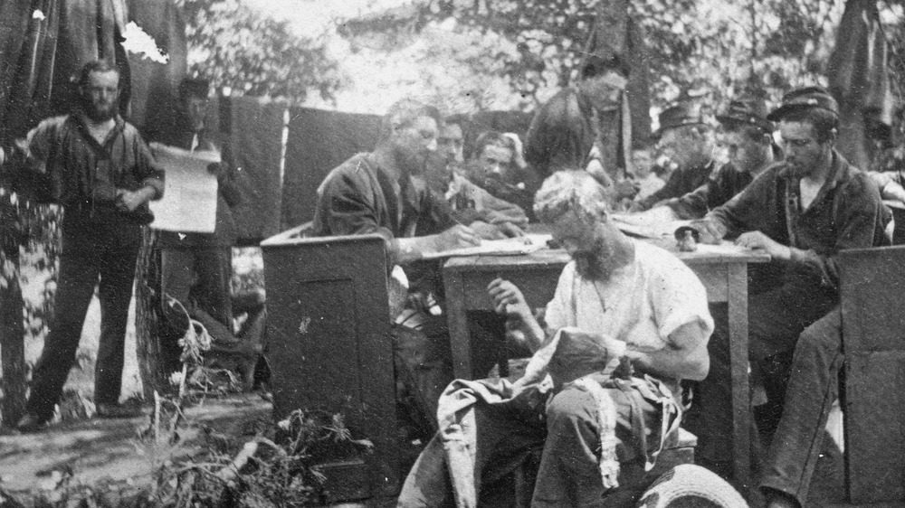 American Civil War Union Soldiers recline by the Potomac River