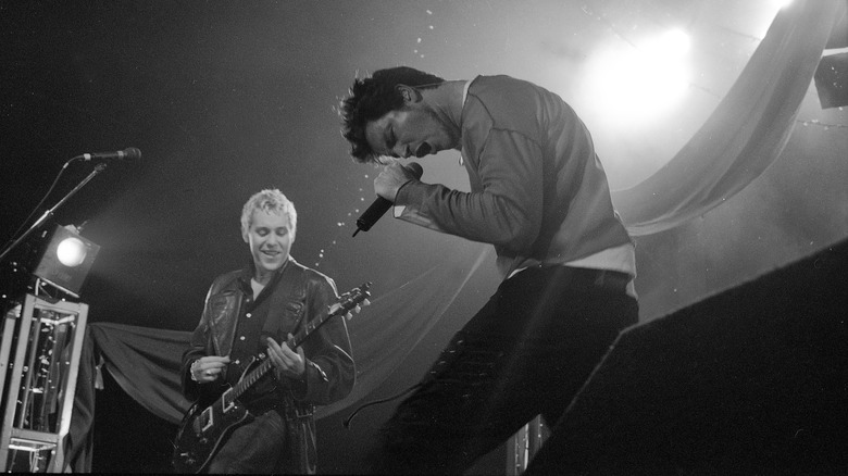 Kevin Cadogan and Stephan Jenkins onstage 