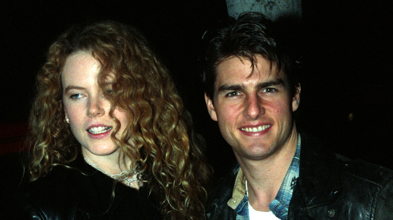 Nicole Kidman and Tom Cruise exit a movie theater