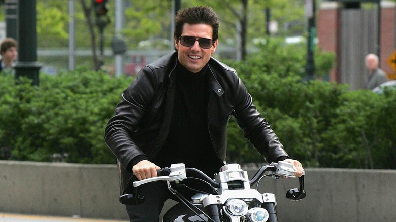 Tom Cruise riding a motorcycle