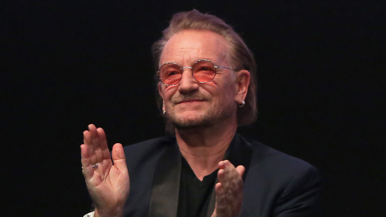 Bono clapping