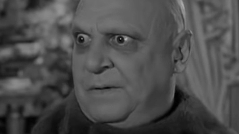 Jackie Coogan as Uncle Fester on The Addams Family