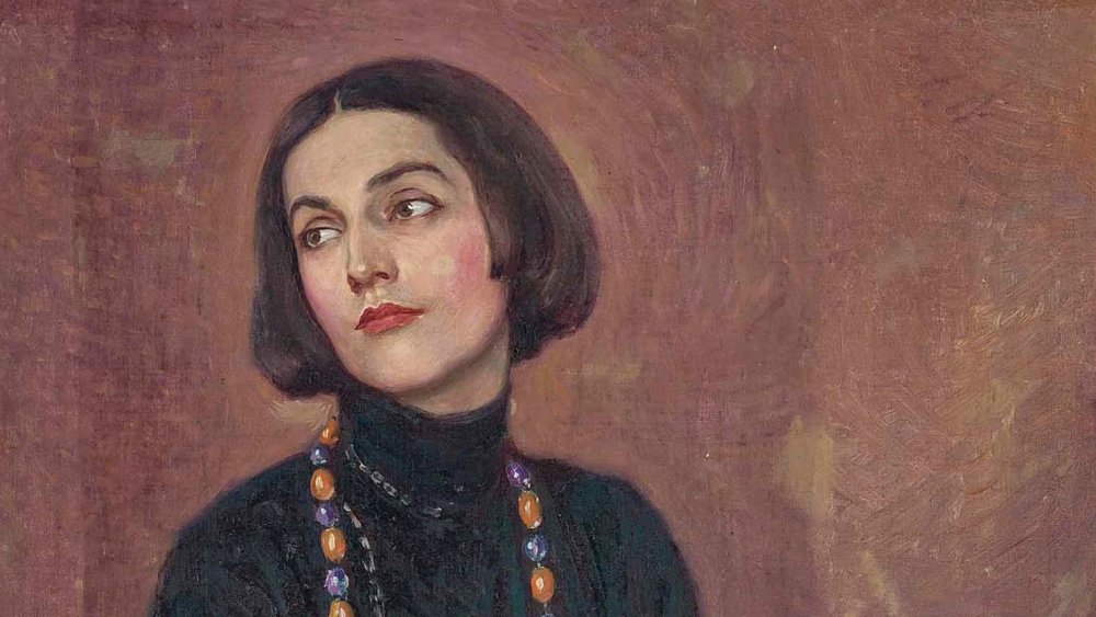  Portrait of Isadora Duncan, wearing a blue dress, with a beaded necklace, Paul Swan, 1922