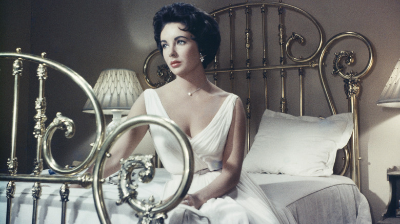 Elizabeth Taylor white dress sat on bed