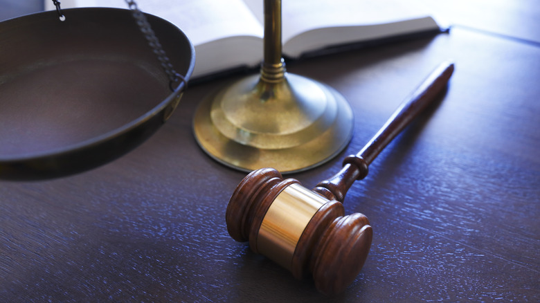 A gavel sits in front of scales
