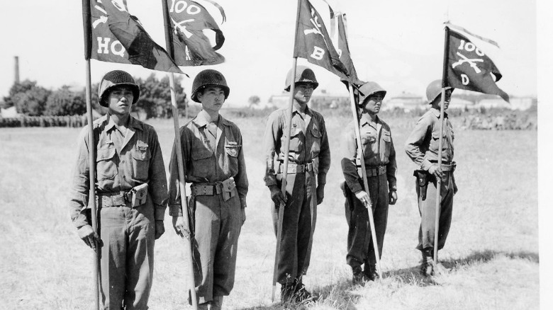 442nd Troops standing with flags