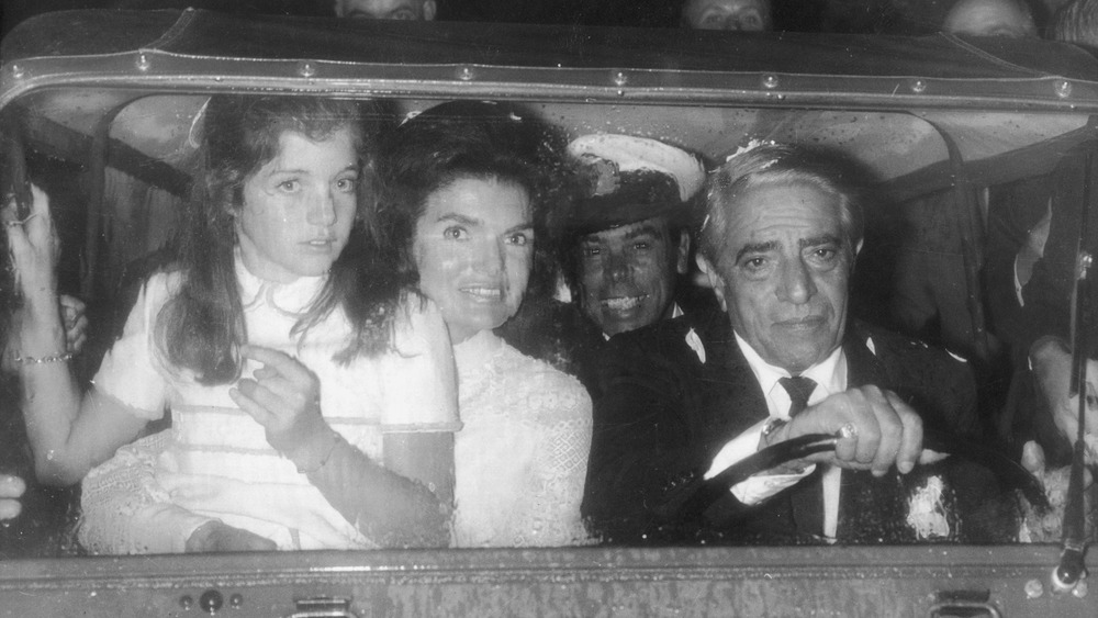 Aristotle Onassis driving with Jacqueline Kennedy Onassis 