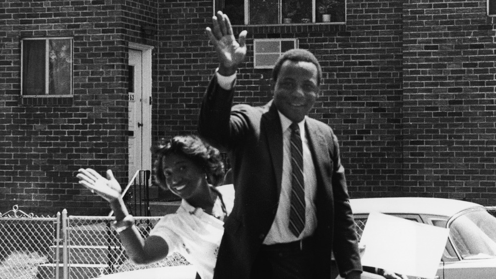W. Wilson Goode and his wife Velma wave from the back of a car following Goode's successful election to as the mayor of Philadelphia, Pennsylvania, 1984.