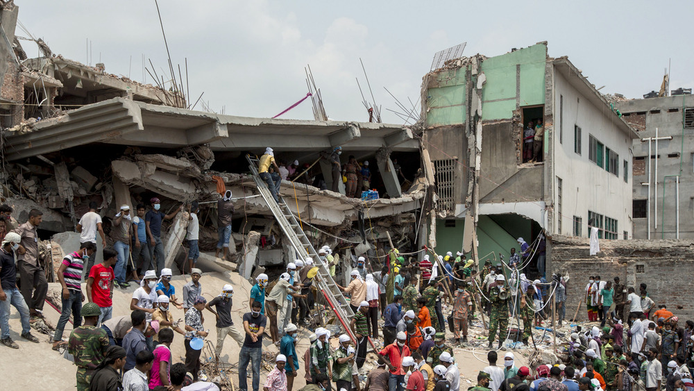 Rescue workers cleaning up debris