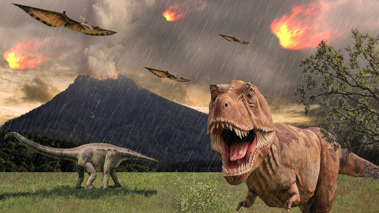 Dinosaurs running away from volcanic eruption
