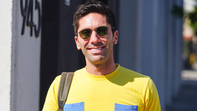 Nev Schulman in bright yellow