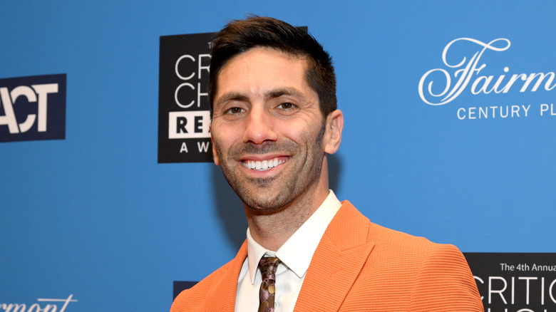 Nev Schulman in orange suit