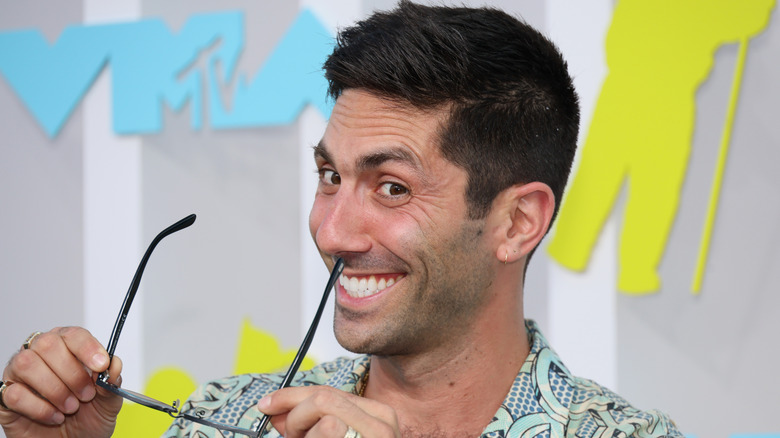 Nev Schulman mugging with sunglasses