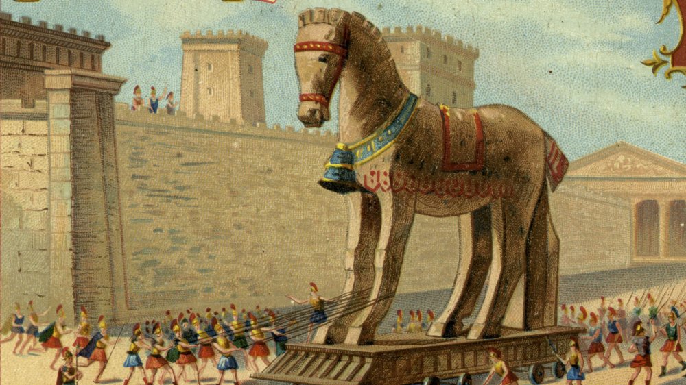 The Trojan Wars: The Wooden Horse is led into the town - from engraving published 1892. 