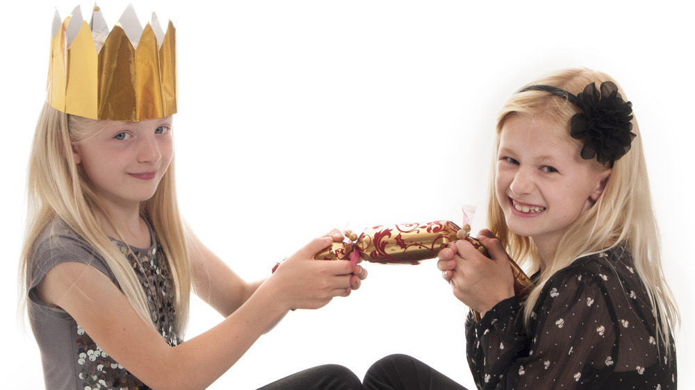 Two girls with Christmas cracker