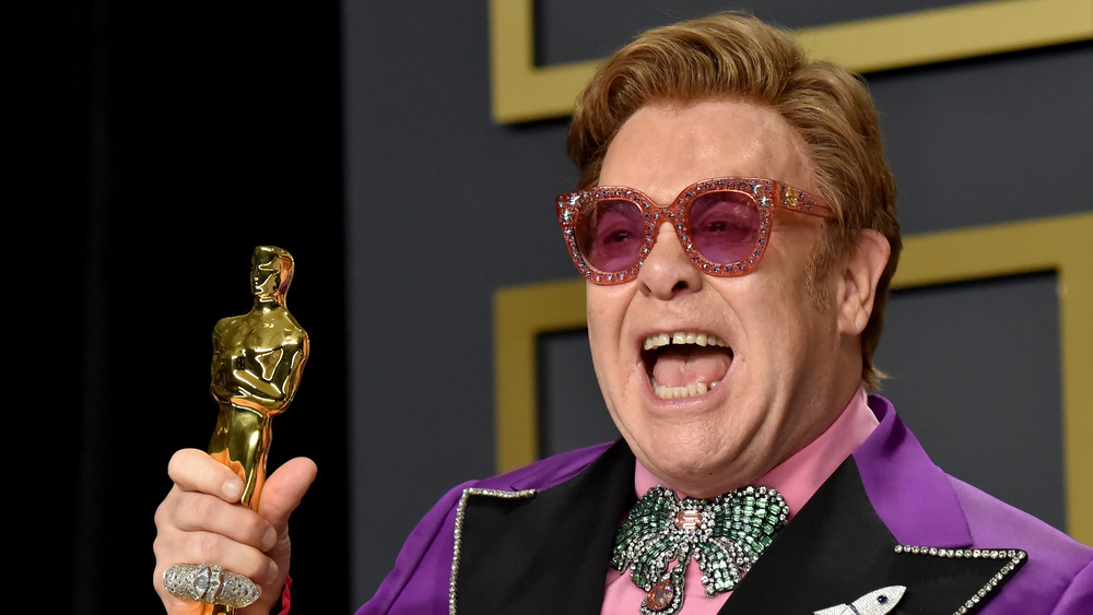 Elton John Holding Oscar