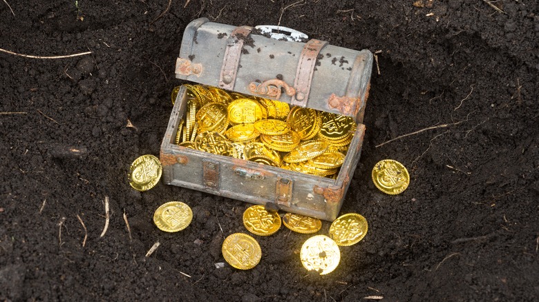 gold in box in dirt
