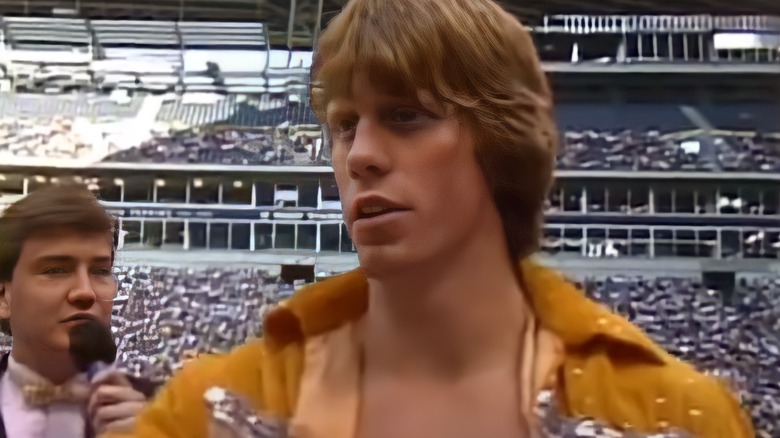 Mike Von Erich looks on