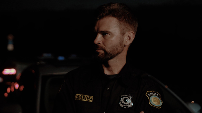 Sinister-looking police officer