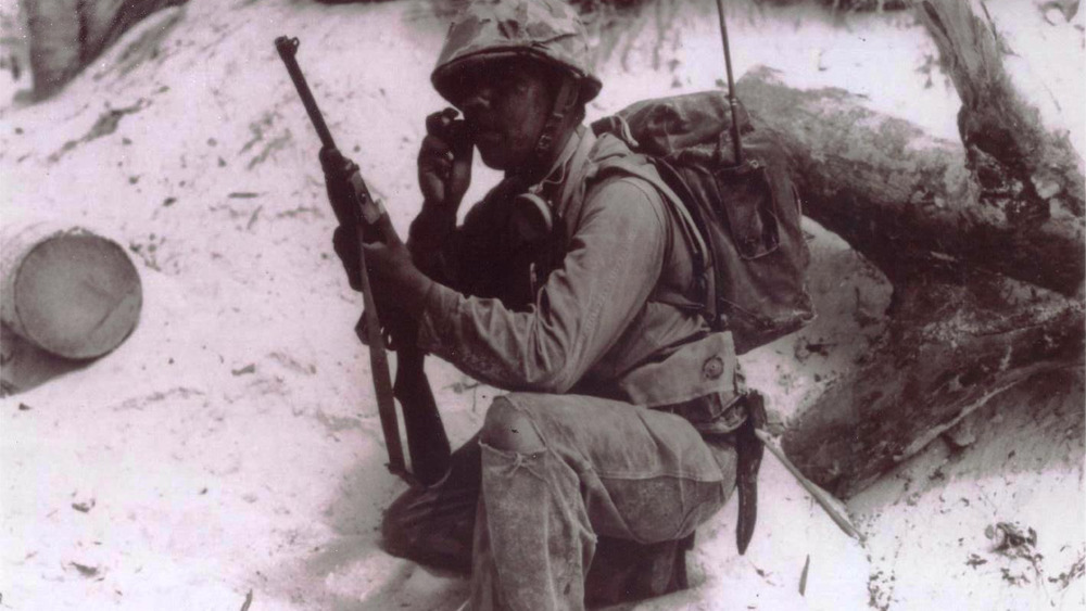 Unknown Code Talker kneeling on ground