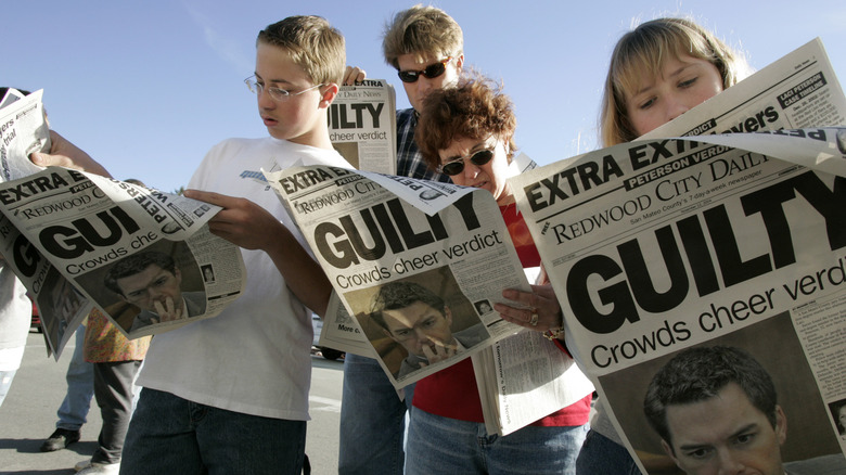 people reading newspaper