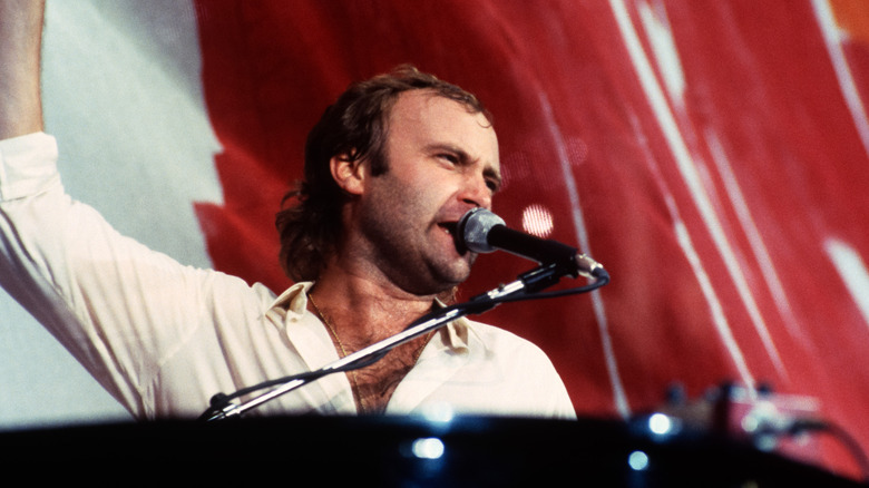 Phil Collins onstage at Live Aid