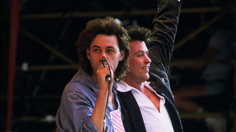 Bob Geldof and Paul Young on stage at Live Aid