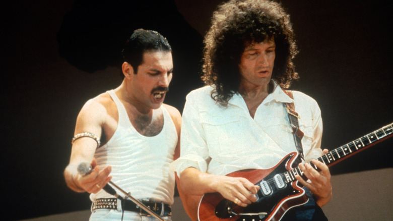 Freddie Mercury and Brian May of Queen perform at Live Aid