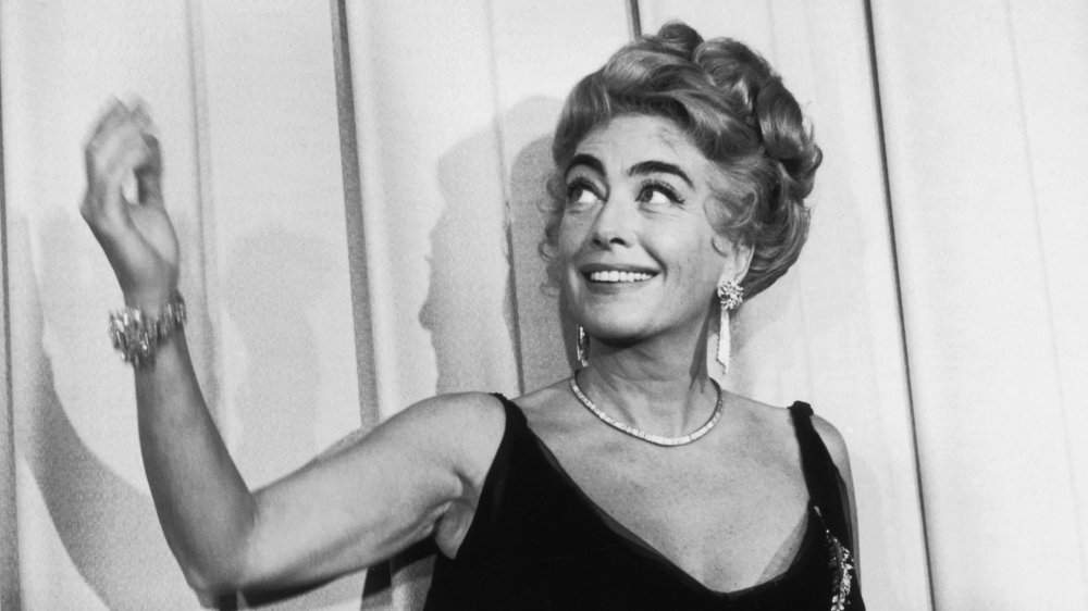 Joan Crawford waving